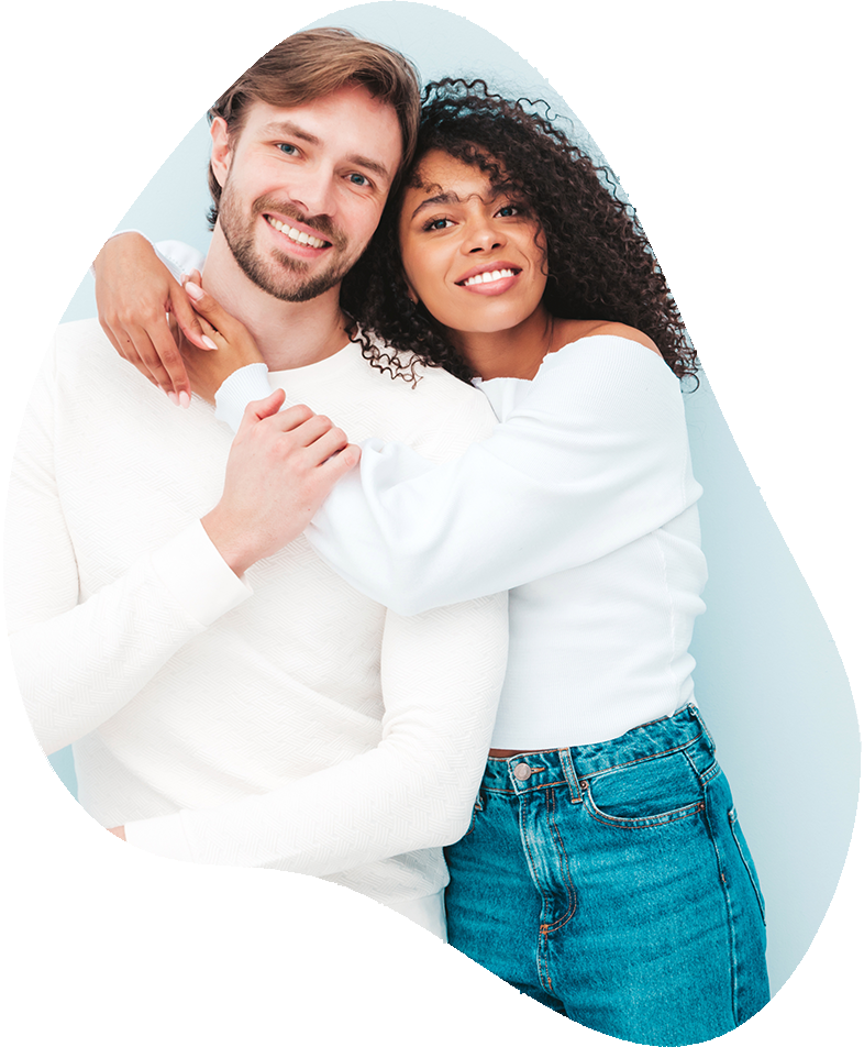 A smiling couple embracing